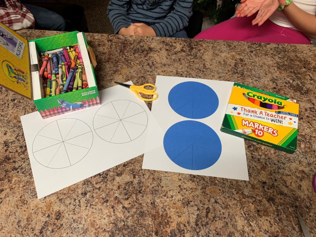 Supplies needed for Pinwheels language activity include scissors, markers, and crayons.